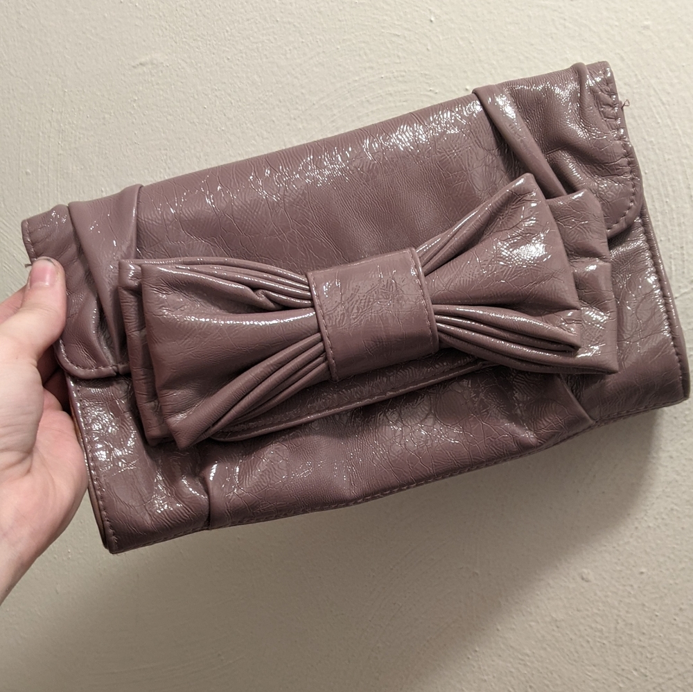 Purple faux leather clutch